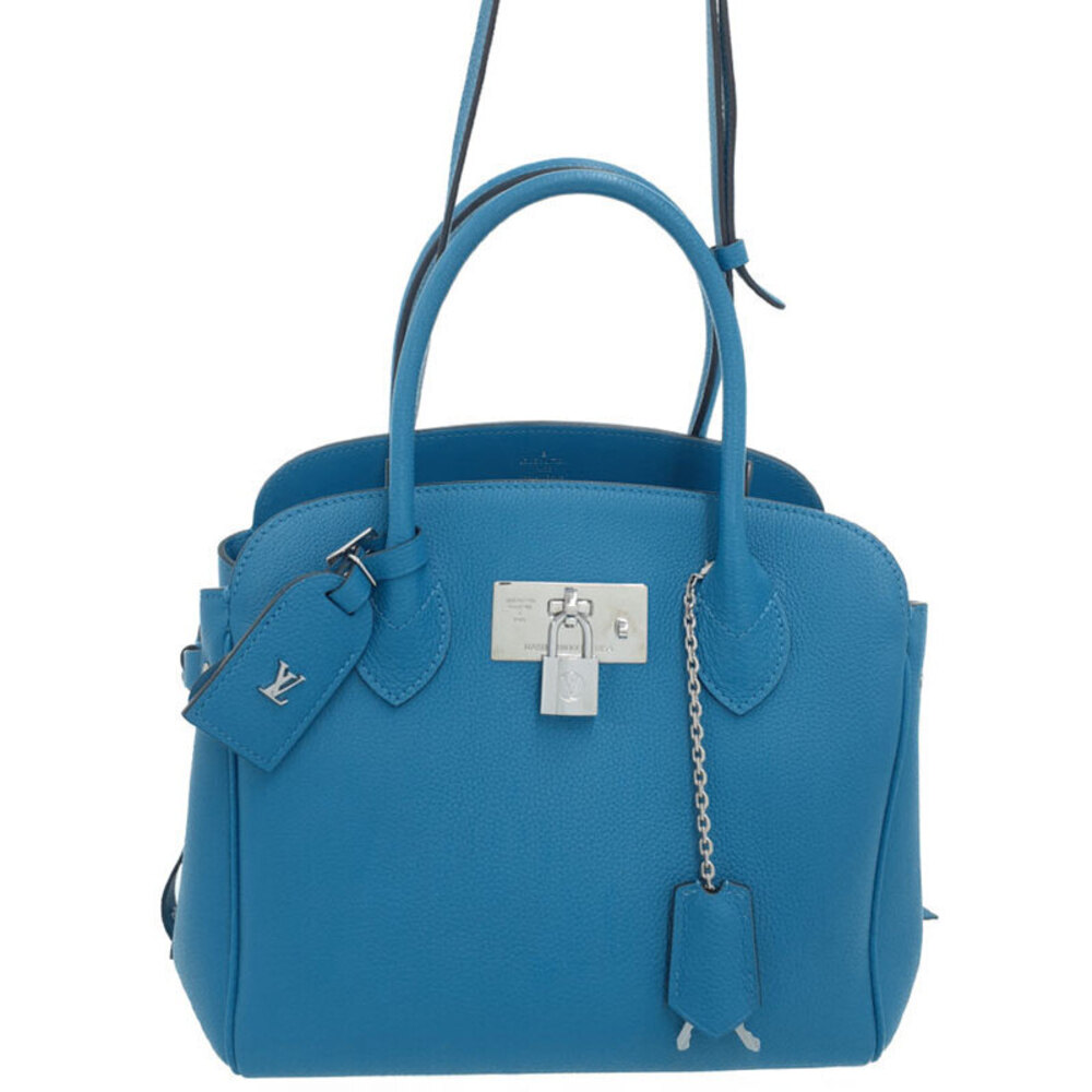 Louis Vuitton Milla bag black pebbled Veau Nuage leather